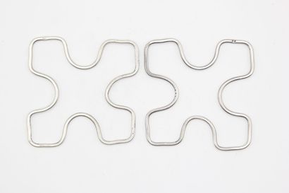 Pair of silver trivets or bottles.

Minerva...