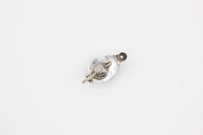 Silver charm representing an 