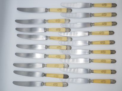 Double set of knives with figured handles....