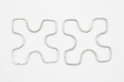 Pair of silver trivets or bottles.

Minerva...