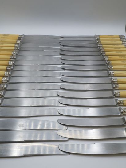 Double set of knives with figured handles....