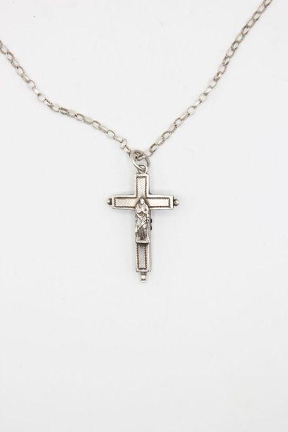 Antique silver reliquary cross. 

The cross...