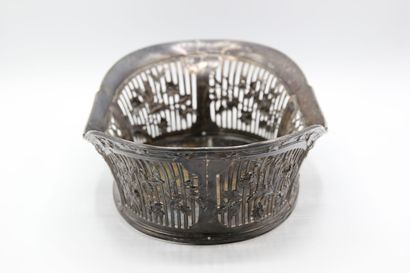 Silver basket with openwork border decorated...