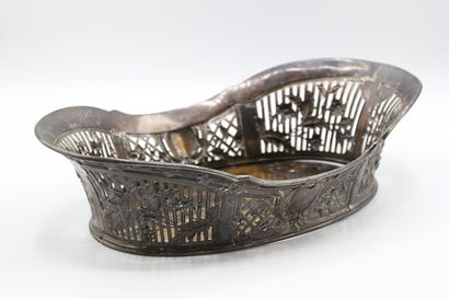 Silver basket with openwork border decorated...