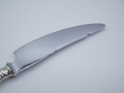 HENIN & Cie.

Cheese knife with silver handle...