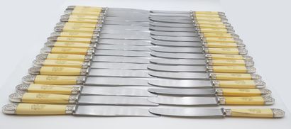Double set of knives with figured handles....