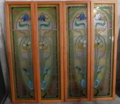 Two pair of stained glass windows in polychrome...