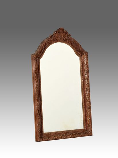 Nice mirror in carved and patinated wood.

The...