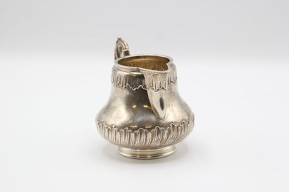 Coffee service in silver with foliage. 

It...