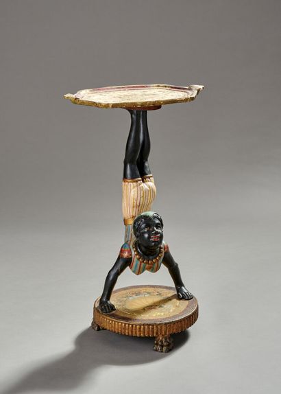 Polychromed wood saddle representing an acrobat...