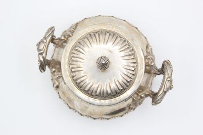Coffee service in silver with foliage. 

It...