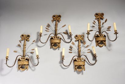 Suite of four sconces with two arms of lights...