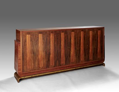 Importante enfilade en placage de palissandre...