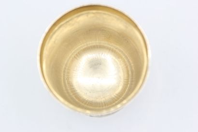 A vermeil tulip-shaped tumbler decorated...