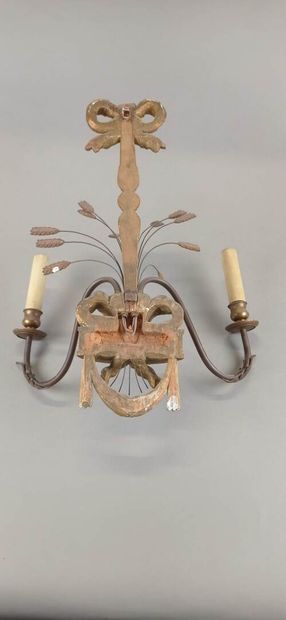 Suite of four sconces with two arms of lights...