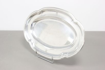 Silver serving dish decorated with nets and...