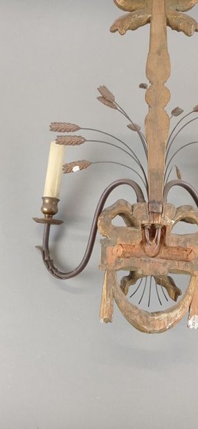 Suite of four sconces with two arms of lights...