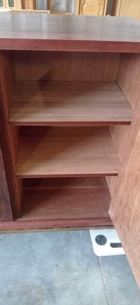 Importante enfilade en placage de palissandre...