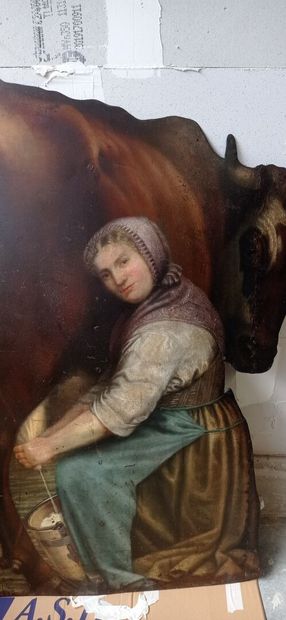 Curious sign of milkmaid in cut and painted...