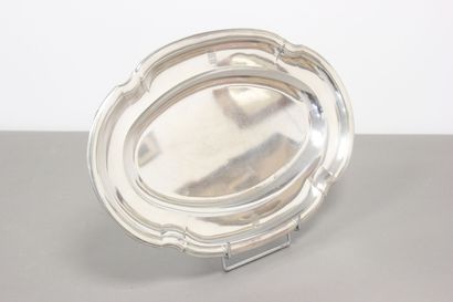 Silver serving dish decorated with nets and...
