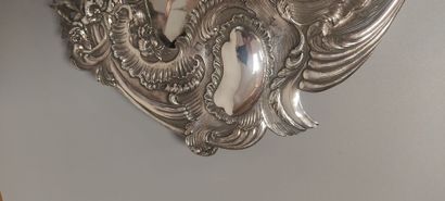 Glass of Louis XV style.

The silver frame...