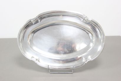 Silver serving dish decorated with nets and...
