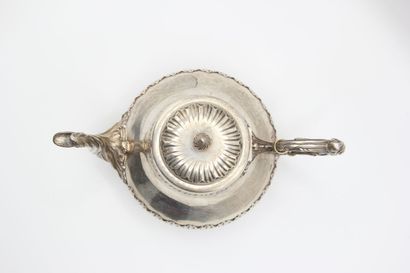 Coffee service in silver with foliage. 

It...