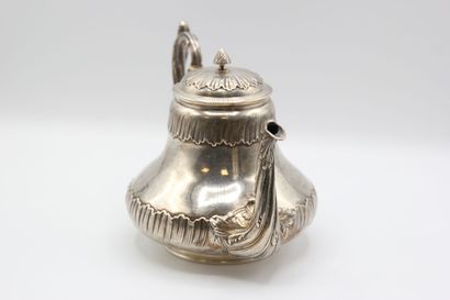 Coffee service in silver with foliage. 

It...