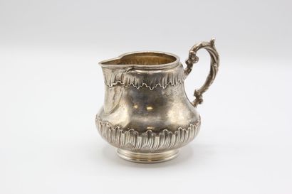 Coffee service in silver with foliage. 

It...