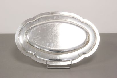 Silver serving dish decorated with nets and...