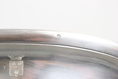 Silver serving dish decorated with nets and...
