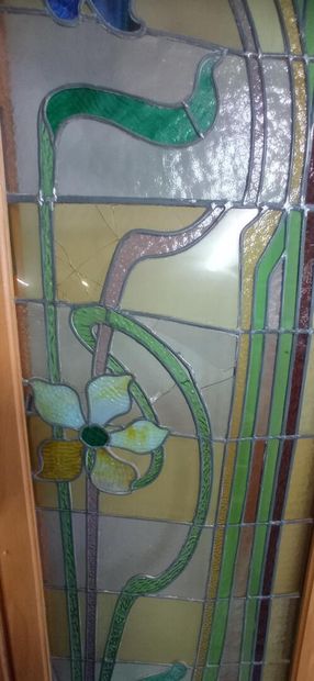 Two pair of stained glass windows in polychrome...