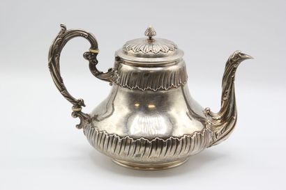 Coffee service in silver with foliage. 

It...