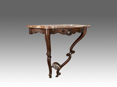 Console of curved form in natural wood

Carved...