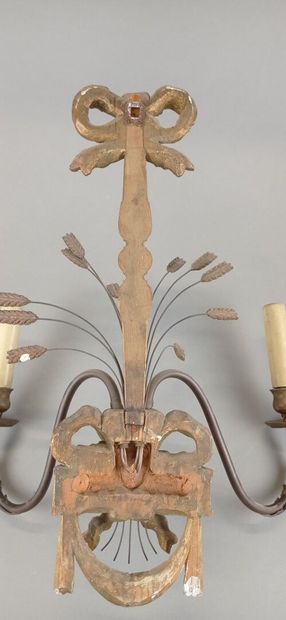 Suite of four sconces with two arms of lights...