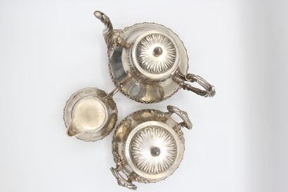 Coffee service in silver with foliage. 

It...