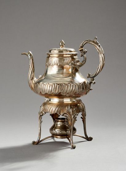 Silver and metal tea fountain.

The upper...