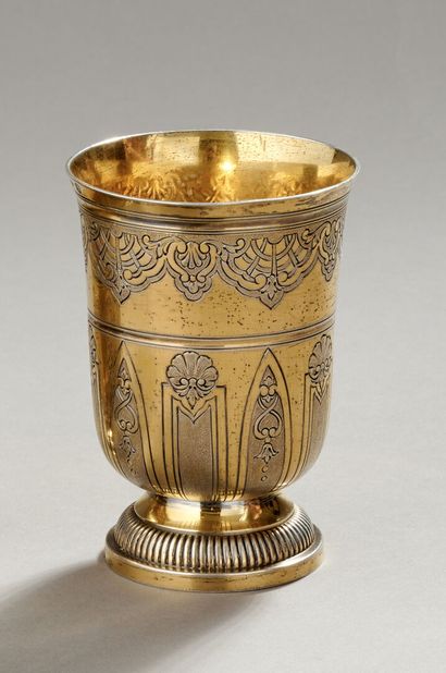 A vermeil tulip-shaped tumbler decorated...
