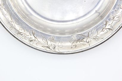 Assiette à bouillie en argent.

Décor de...