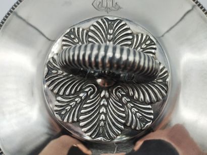 Silver covered vegetable dish.

Body and...