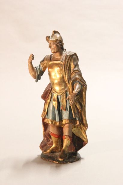 Antique soldier in armor.

Subject in polychromed...