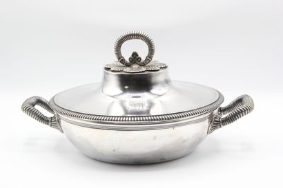 Silver covered vegetable dish.

Body and...