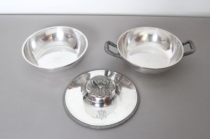 Silver covered vegetable dish.

Body and...