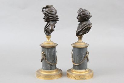 Pair of patinated bronze desk busts representing...
