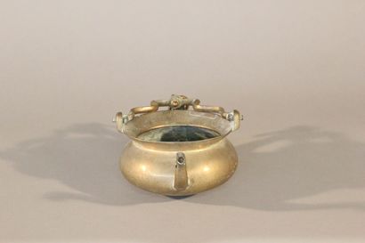 Bronze pitcher with two spouts and a mobile...