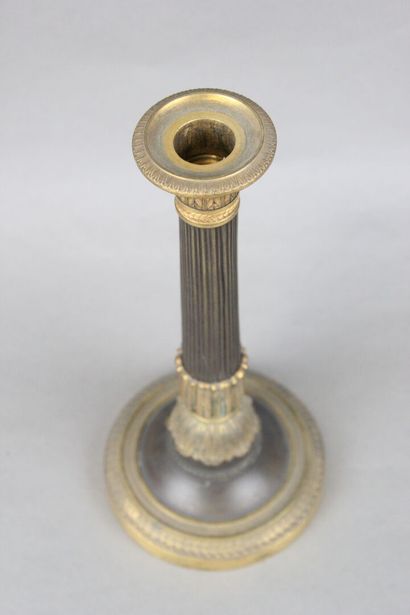 Pair of candelabras with four lights in chased,...