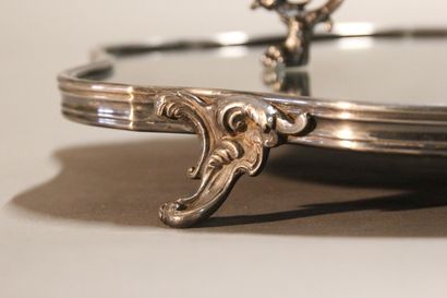 Table top in silver plated metal in two parts.

The...