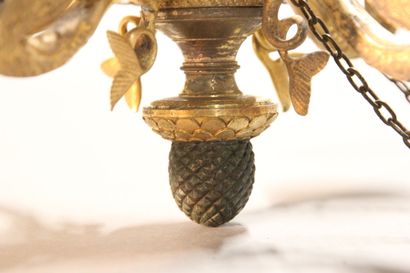 Small chandelier in gilded and chased bronze.

With...