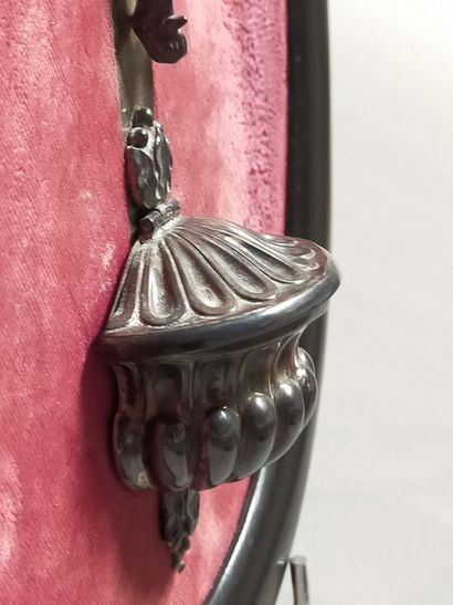 Christ on the cross in silver.

On a red...
