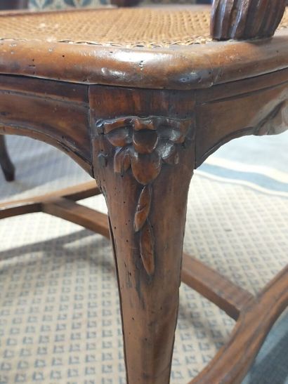 Armchair in natural wood molded and carved...